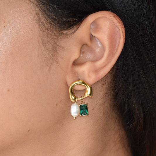 Pearl Jade Duet earring worn on ear with pearl and green zircon