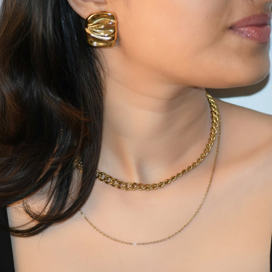 The It-Girl Necklace styled with Pleated Stud earrings
