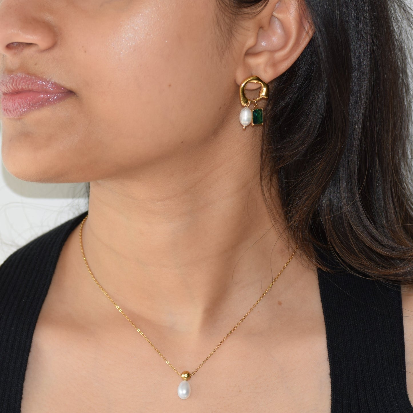 Pearl Jade Duet earrings close up in gold finish