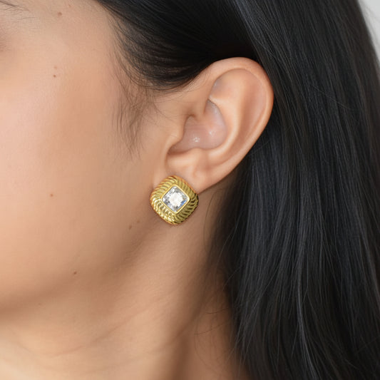 Legacy crystal zircon stud earring worn on ear
