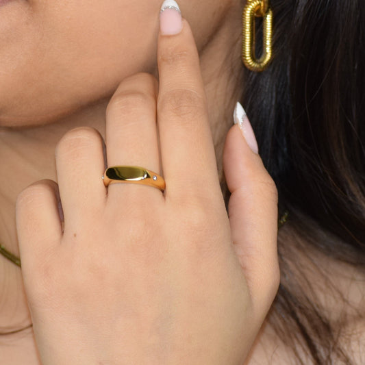 Gold North Star Signet Ring worn on hand