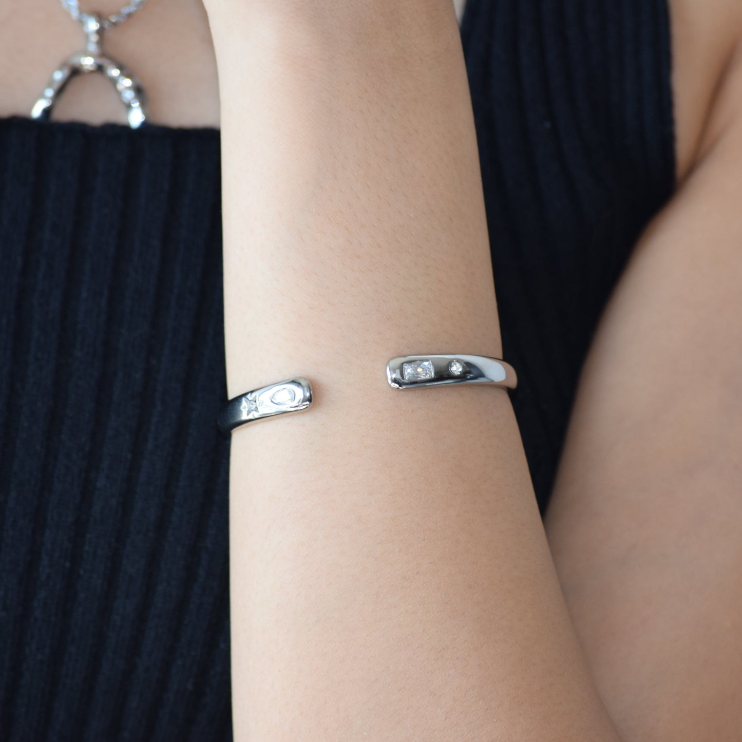 Silver Open Secret Cuff worn on wrist