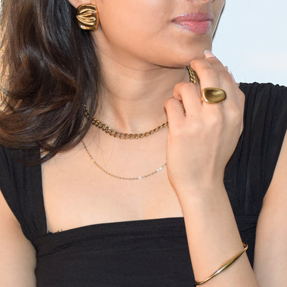 Gold Polished Pebble Ring worn on hand