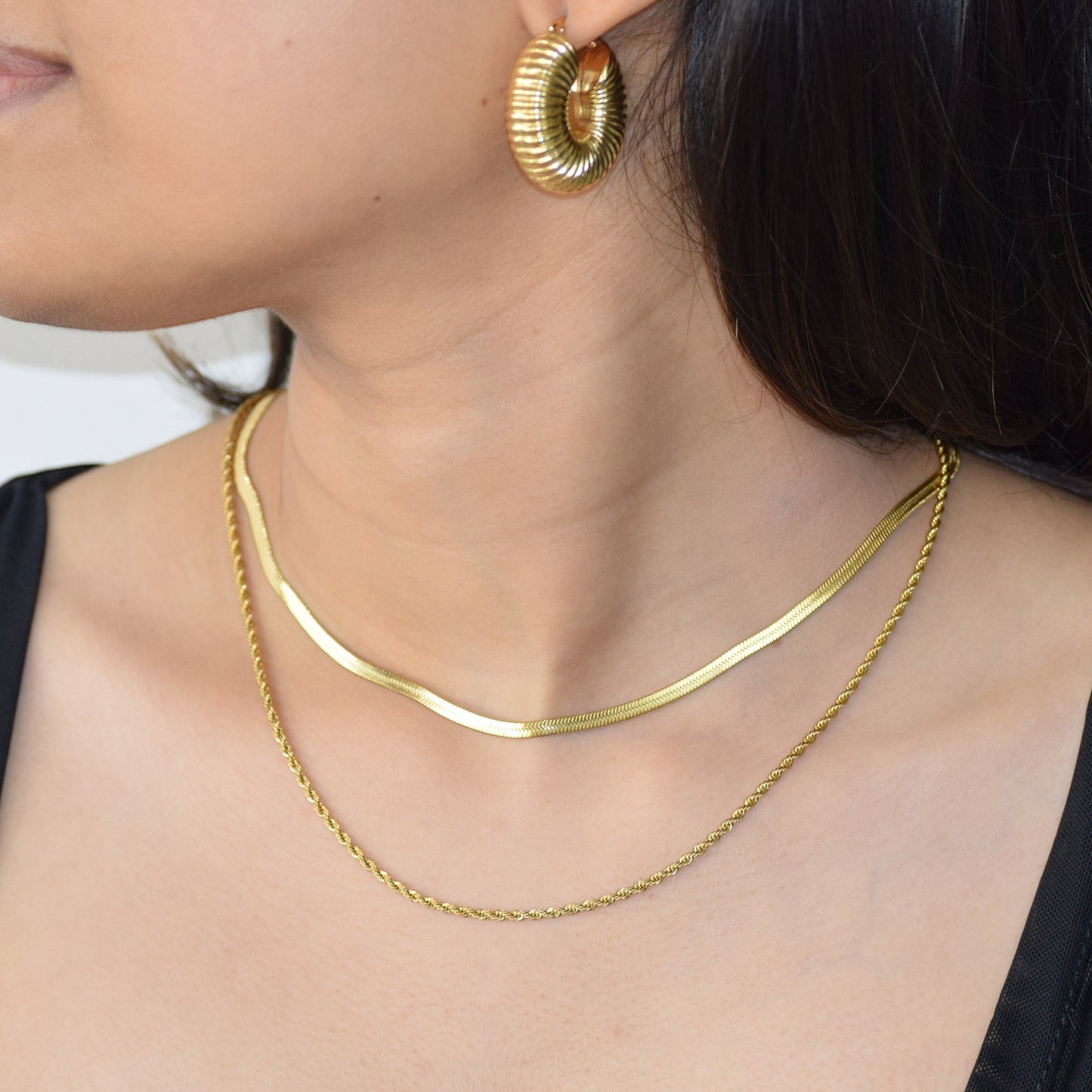 Classic Layered Herringbone Necklace styled on neckline