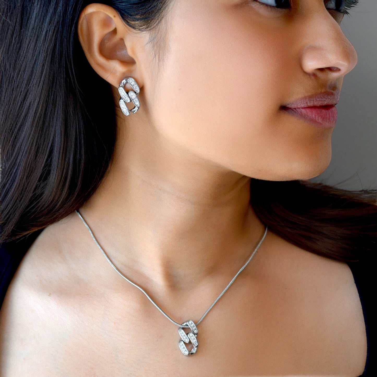 Silver Unity Link Studs styled on model