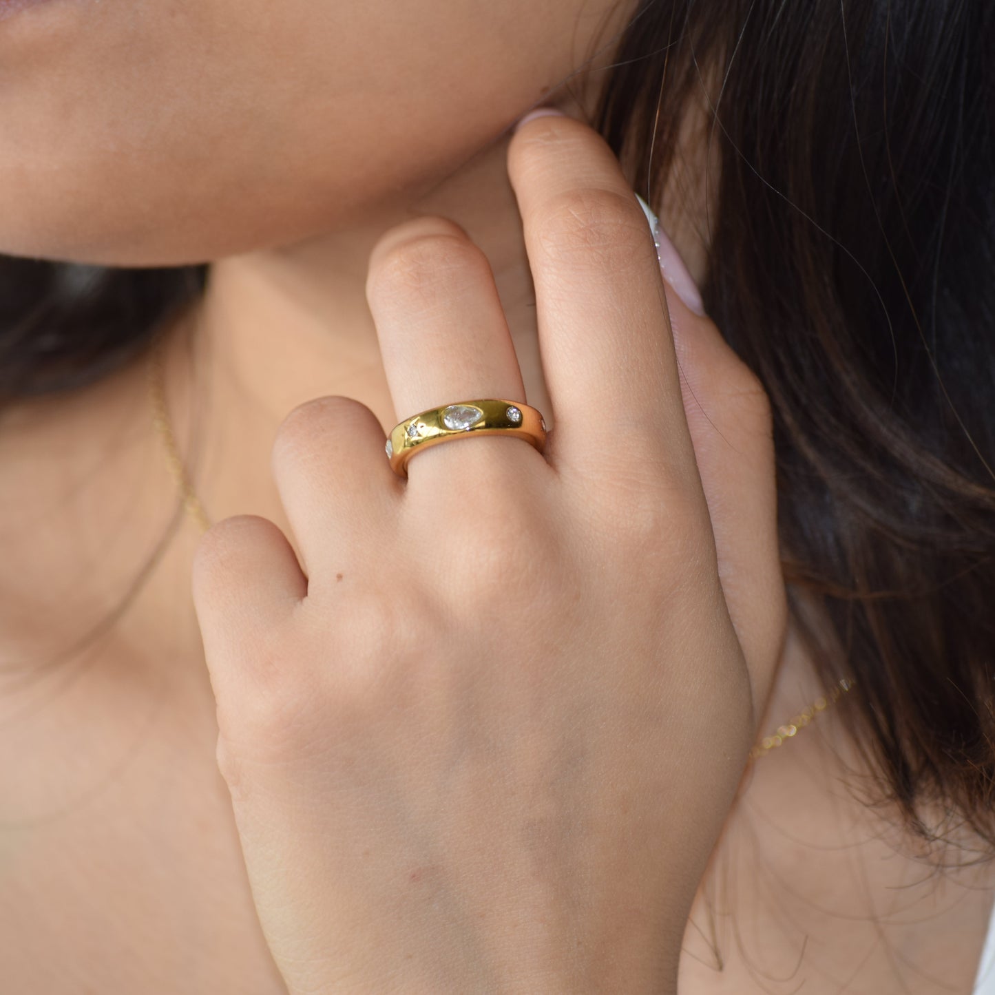 Gold Mosaic zircon ring worn on hand