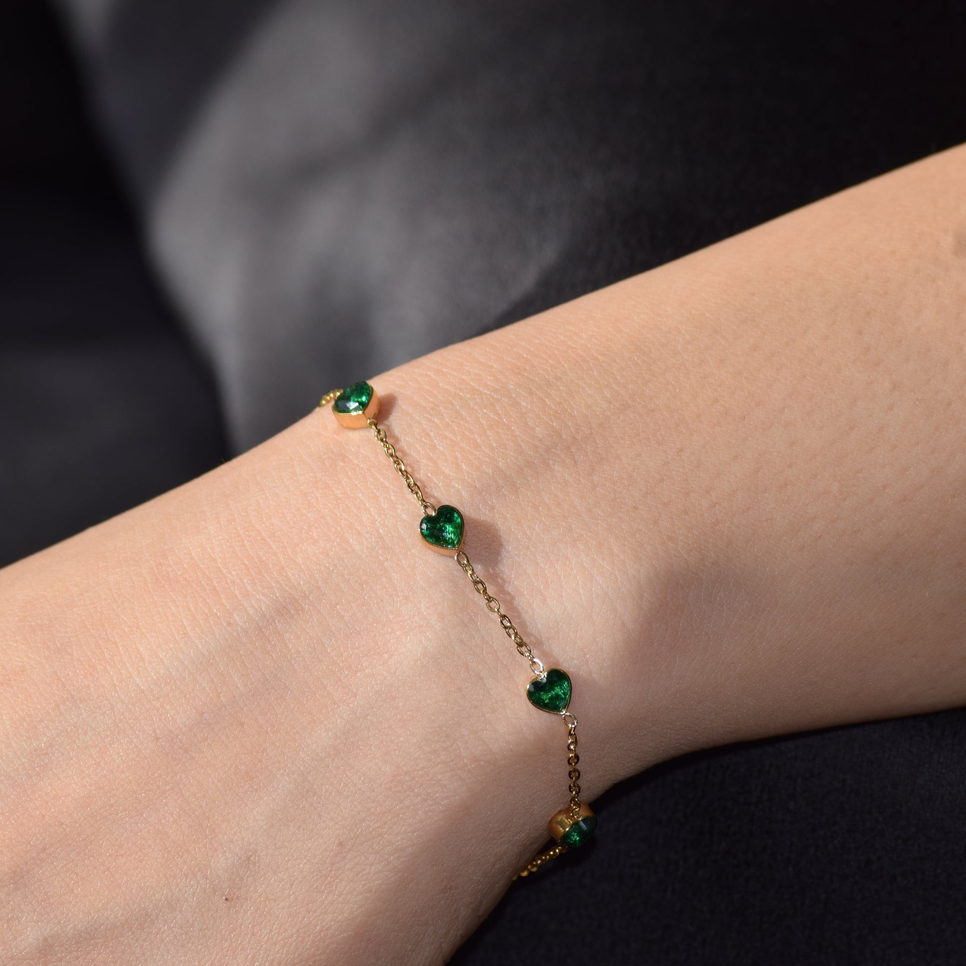 Jade Hearts Bracelet styled on model in gold finish