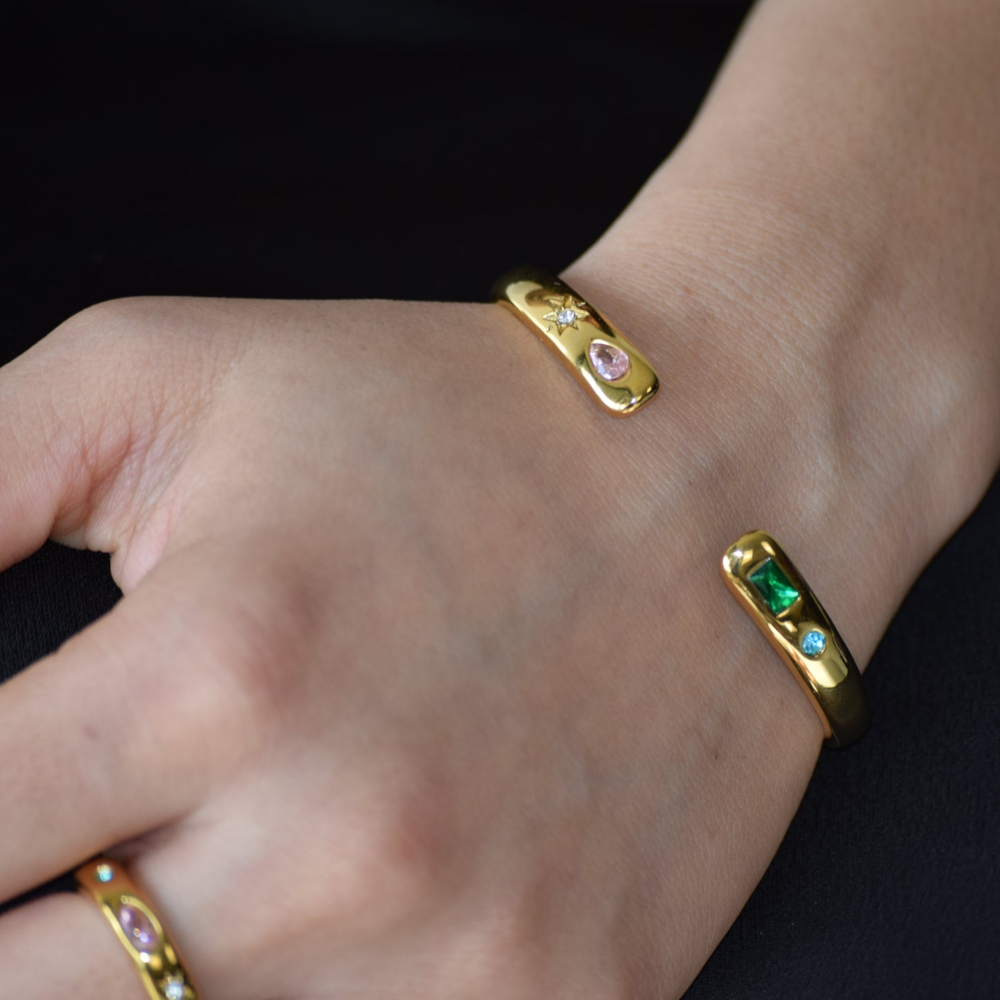 Gold Open Tutti Frutti Cuff worn on wrist with colourful zircon accents