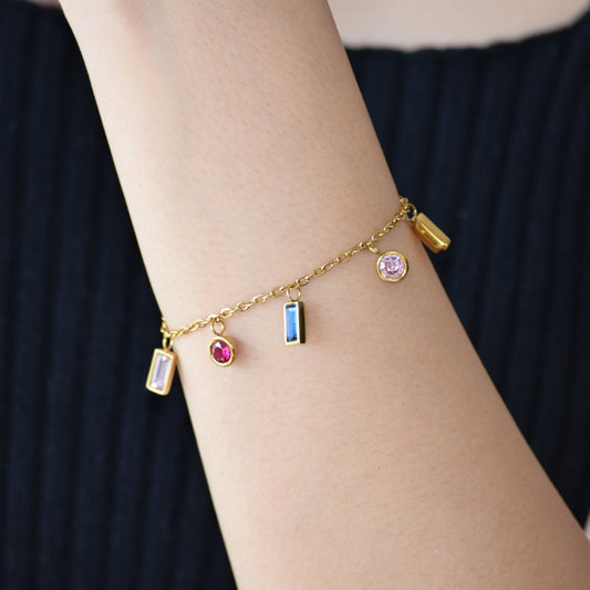 Gold Rainbow Bracelet worn on wrist with colourful zircon accents