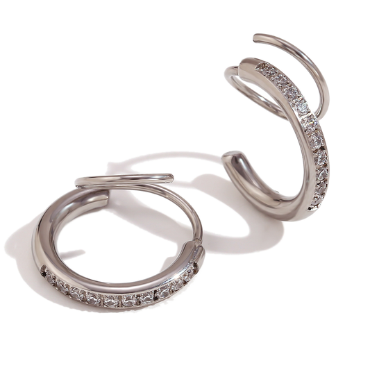 Twister Pave zircon huggies in polished stainless steel