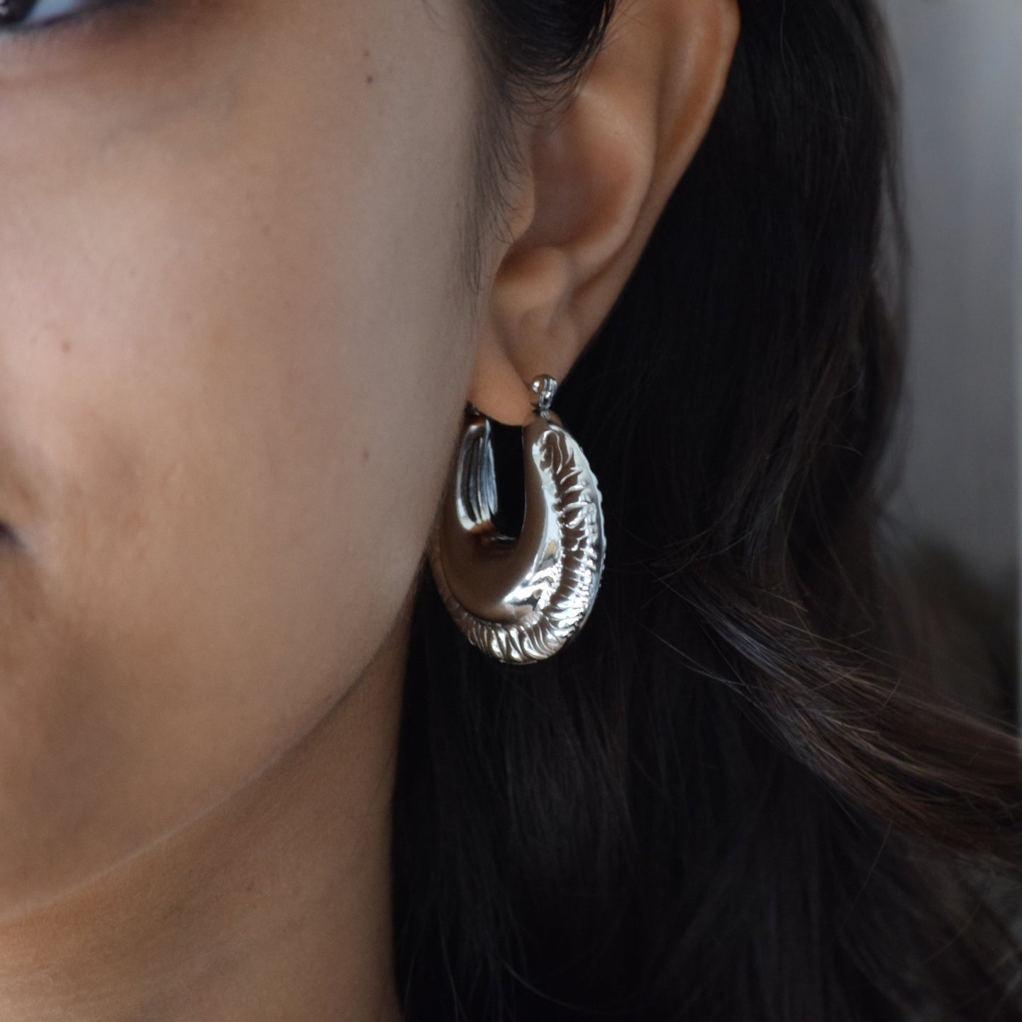 Silver Armada Hoops styled on model with bold hoop shape
