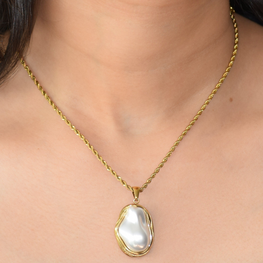 Wrapped Baroque Pearl Pendant Necklace styled with matching studs