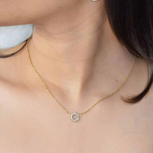 Gold Helios Pendant Necklace worn on model