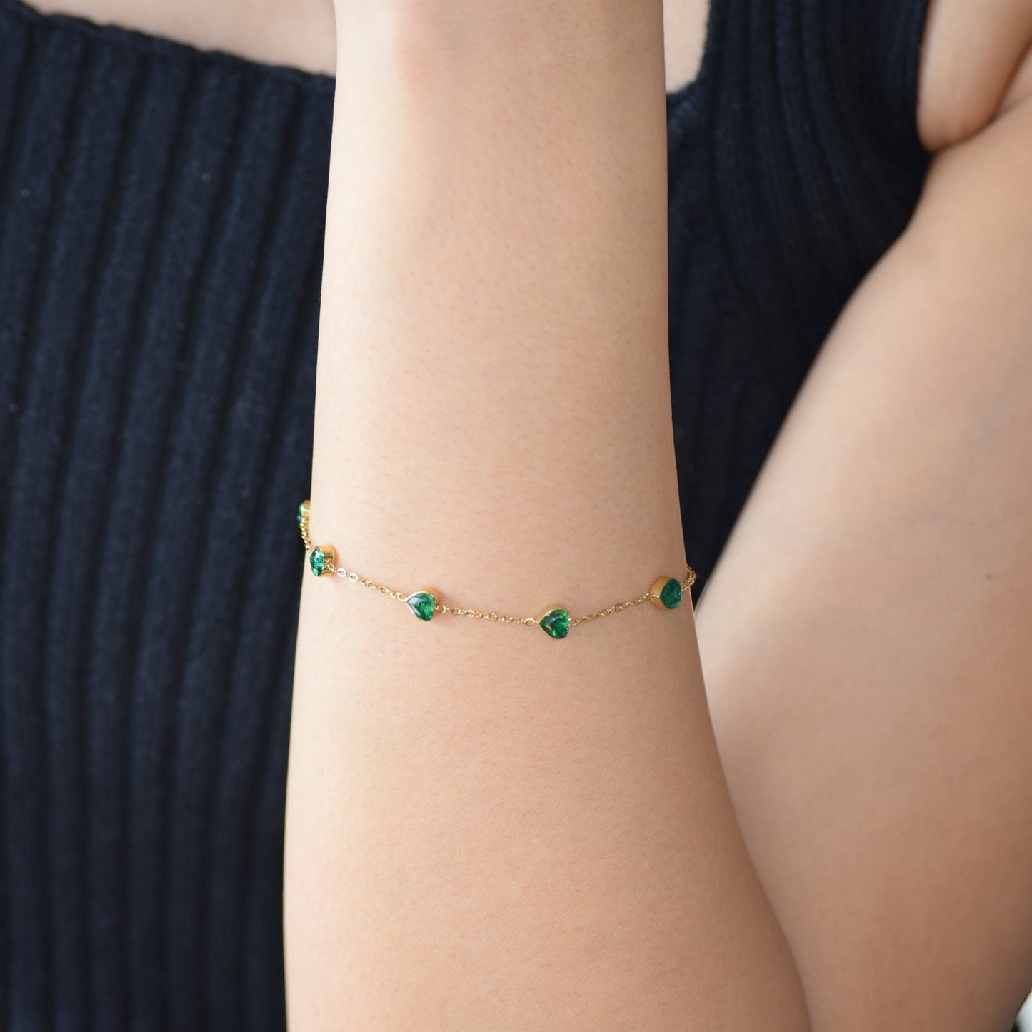 Gold Jade Hearts Bracelet worn on wrist with green heart accents