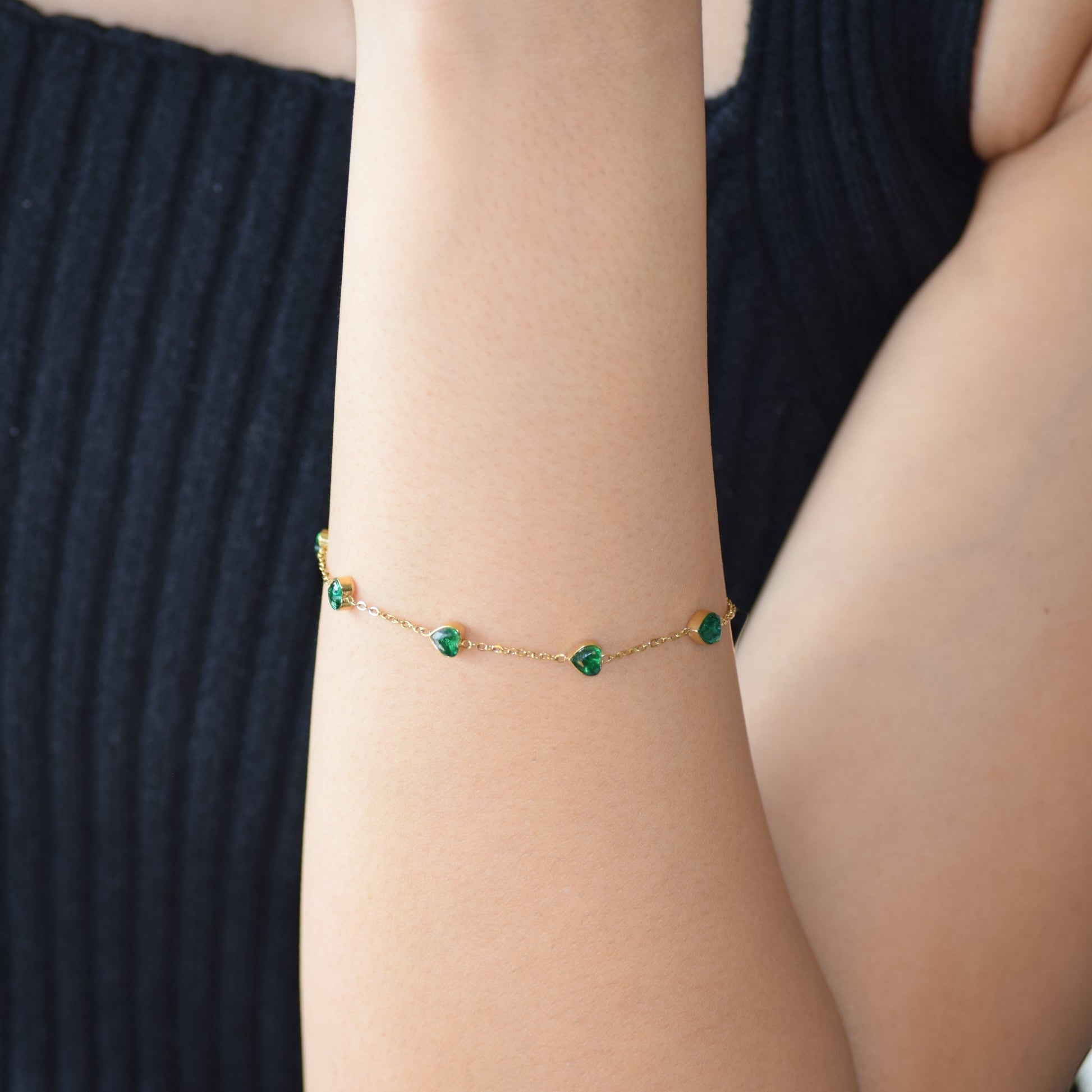 Gold Jade Hearts Bracelet worn on wrist with green heart accents