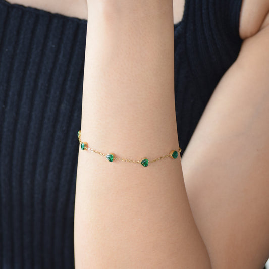 Gold Jade Hearts Bracelet worn on wrist with green heart accents