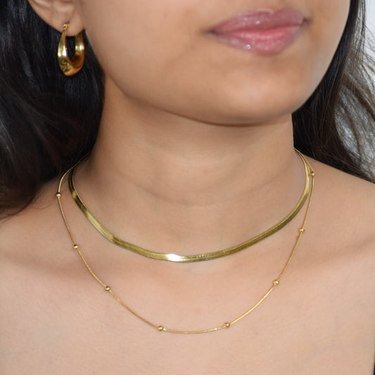 Gold Layered Serpent Chain Necklace worn on model