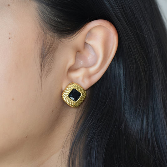 Legacy onyx black zircon stud earring worn on ear