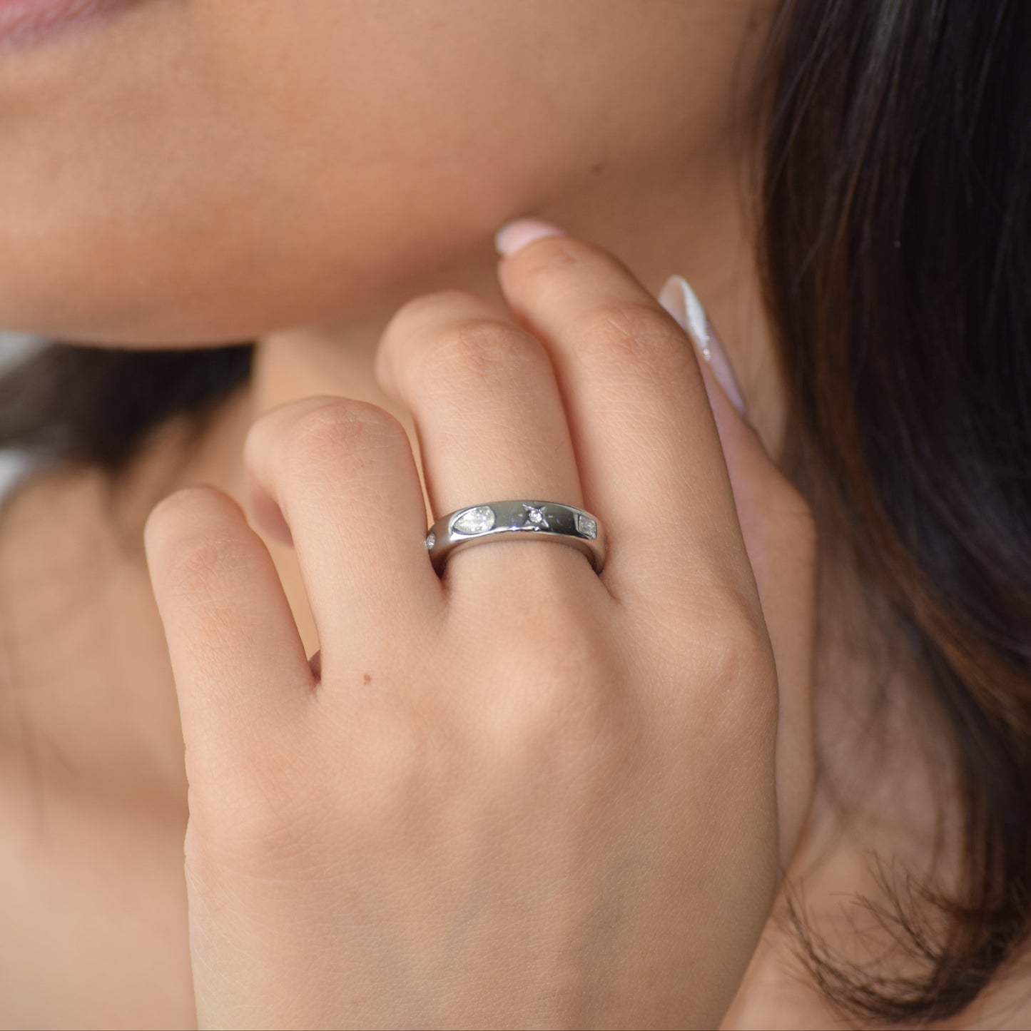 Silver Mosaic zircon ring worn on hand