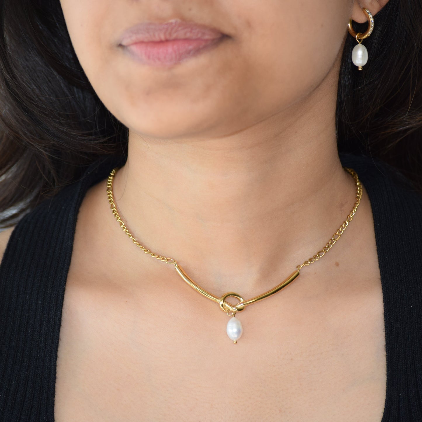 Gold Tie-the-knot Pearl Necklace worn on neckline