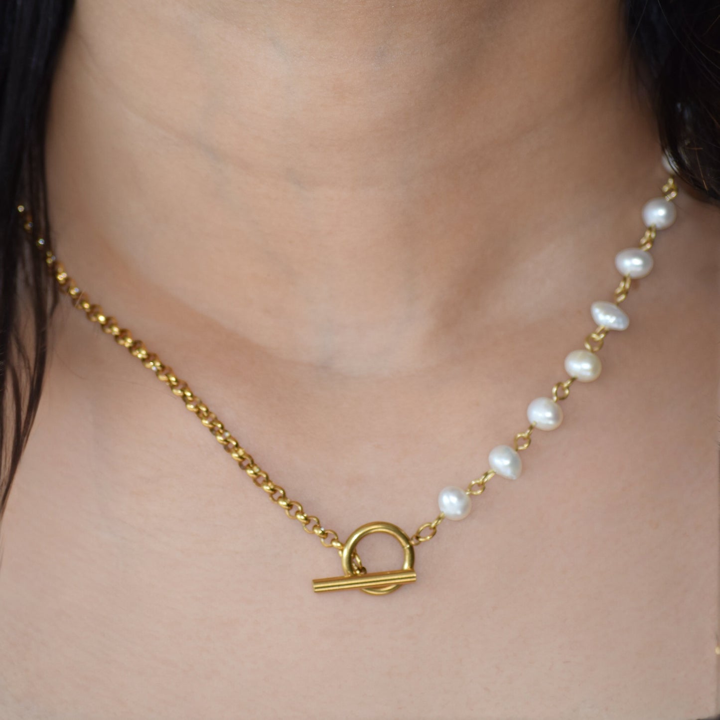 Gold Pearl Toggle Necklace worn on neckline