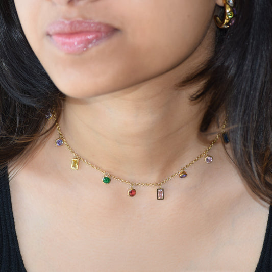 Gold Rainbow Choker worn on neckline with colourful zircon accents