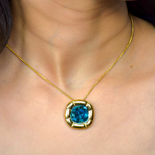 Aqua blue zircon Signature Statement Pendant Necklace in gold setting