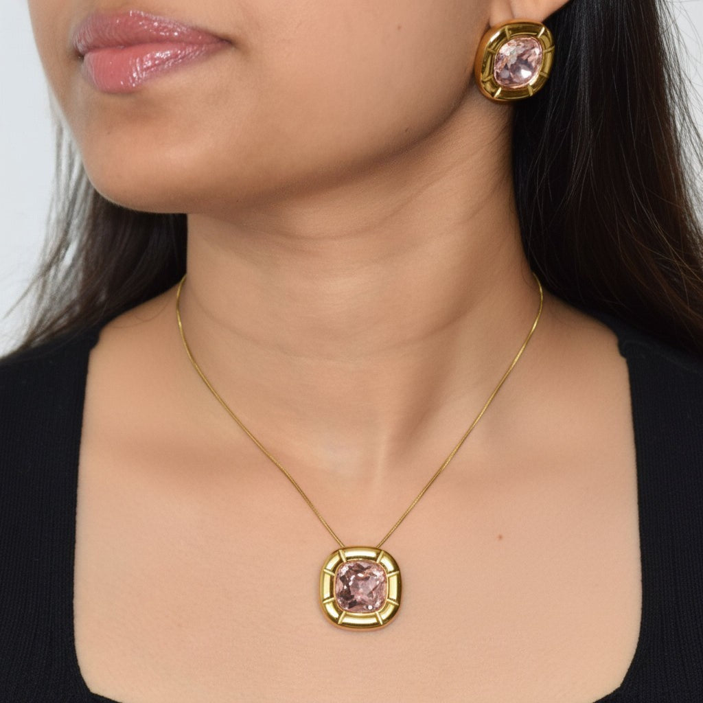 Blush pink zircon pendant necklace worn with matching earrings