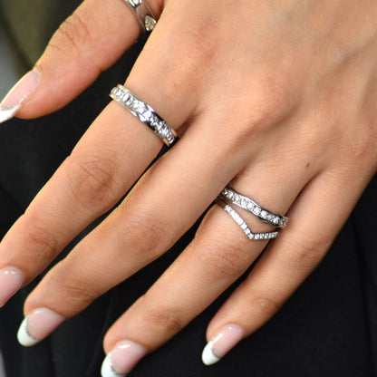 Silver Eternity Ring set worn on hand with zircon bands