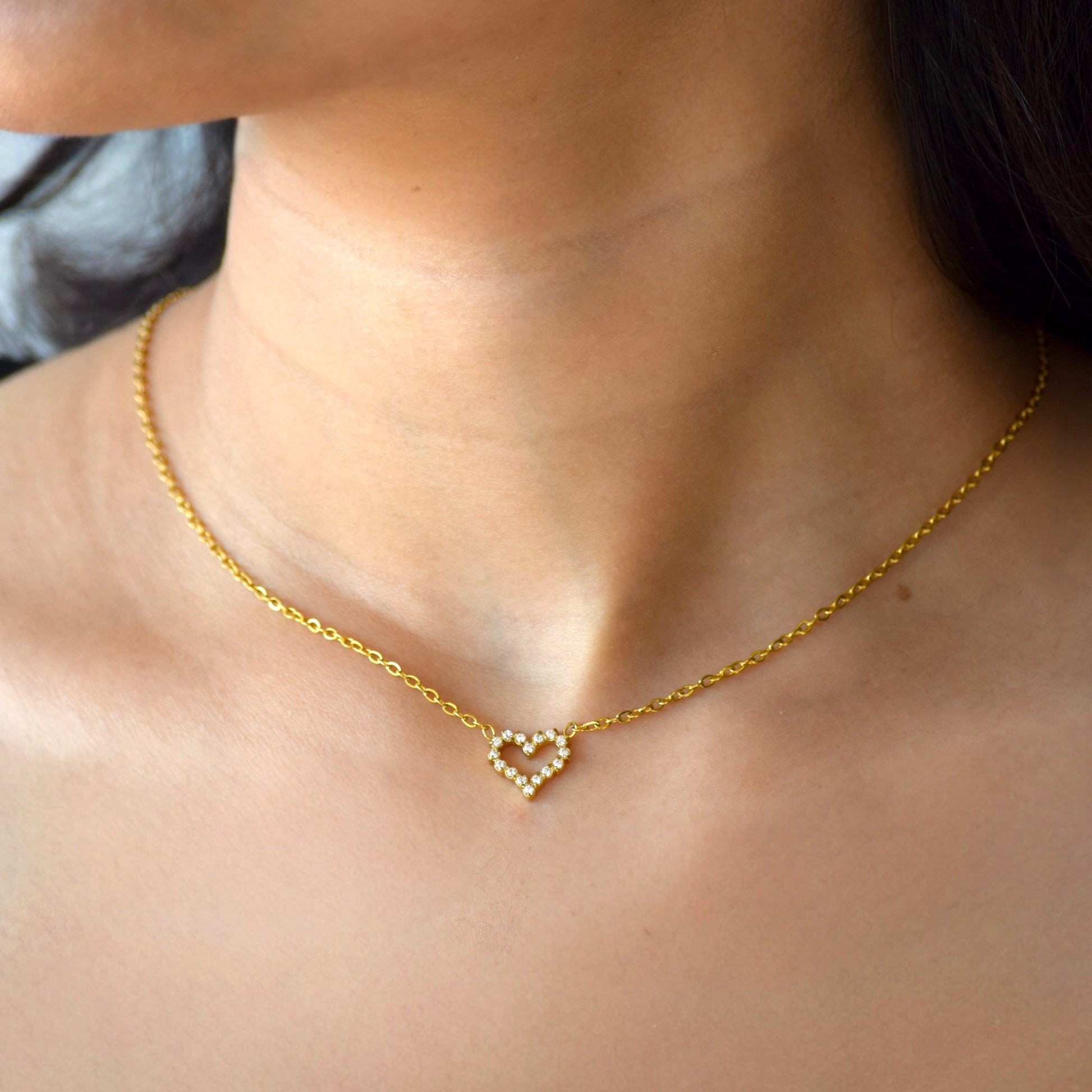Gold Sweetheart zircon heart necklace worn on model