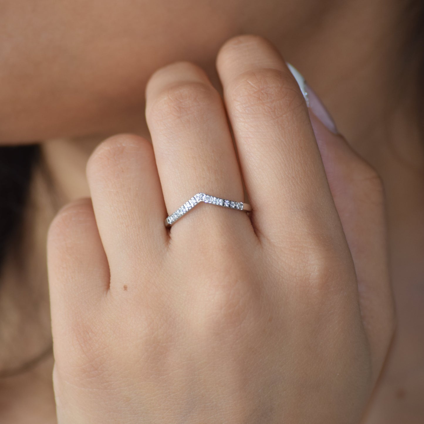 Silver Tiara zircon ring worn on hand