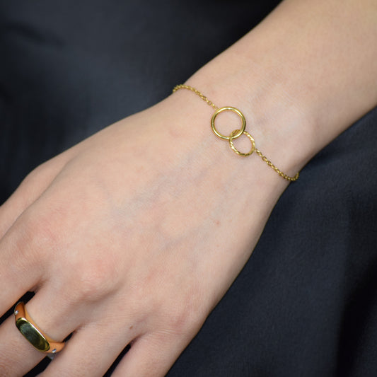 Gold Unity Link Bracelet worn on wrist
