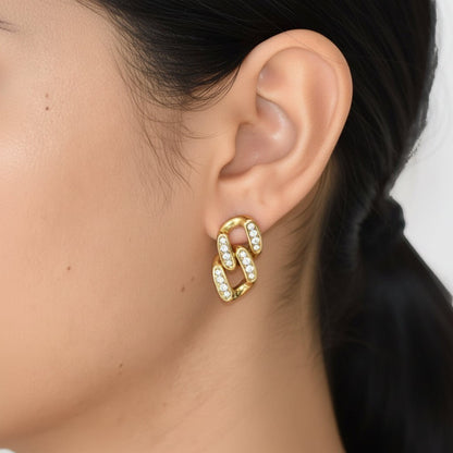 Gold Unity Link Stud earring worn on ear