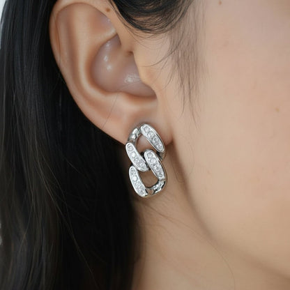 Silver Unity Link Stud earring worn on ear